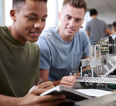 Two students experimenting with STEM irobotics