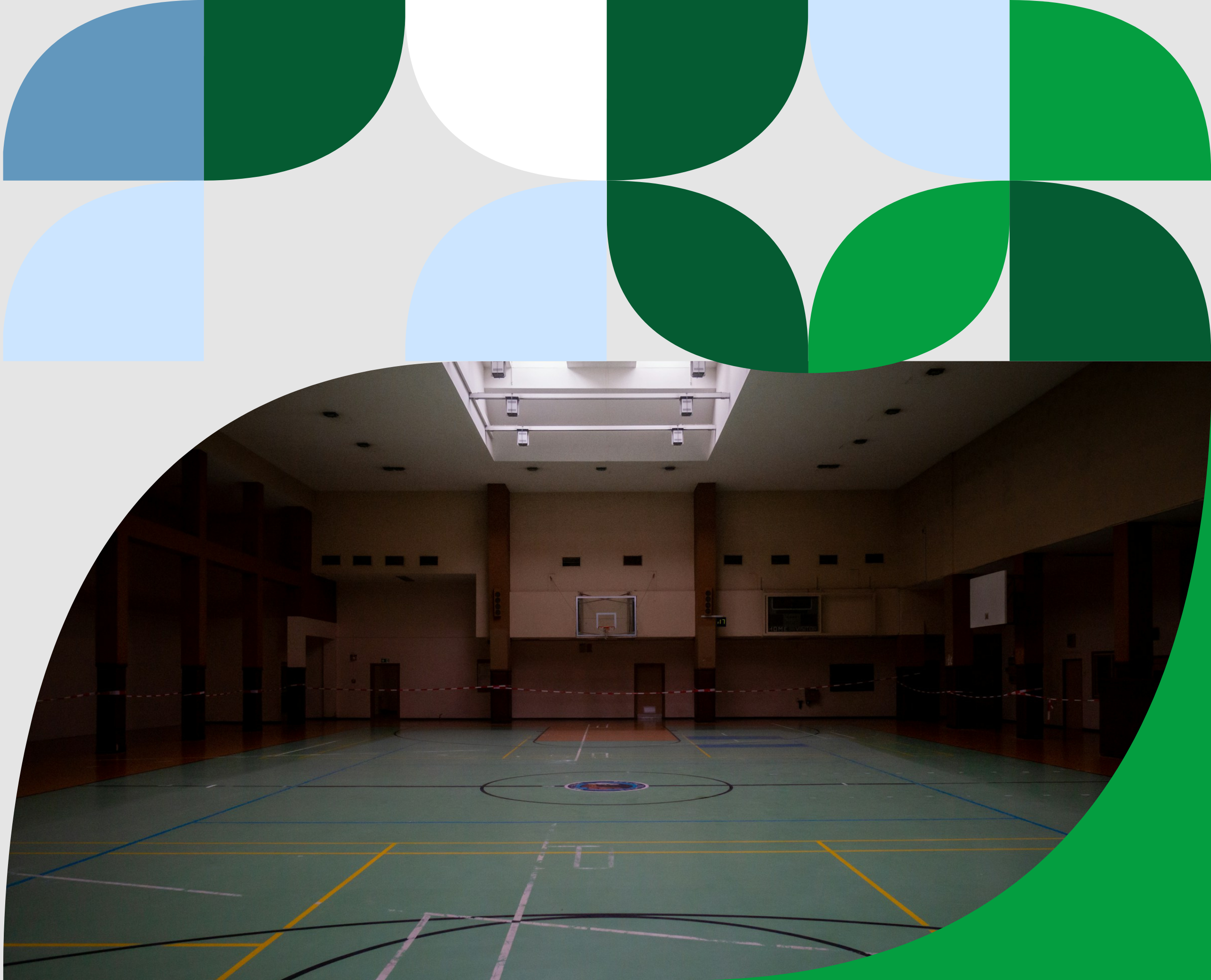 Interior view of a school gymnasium featuring a multi-sport court