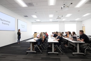 Adults learning in a room.