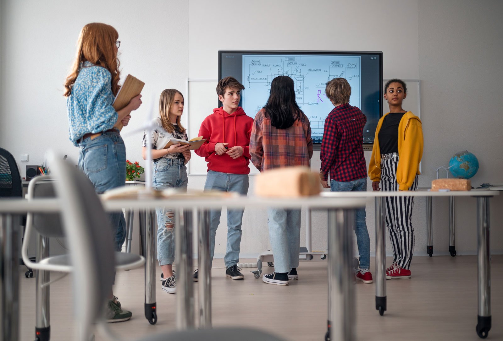 Kids at an interactive flat panel